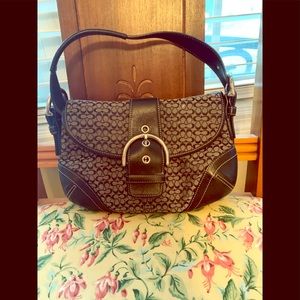 Small cute as can be Coach purse with buckle NWOT